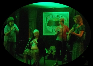 Judy, Pat, Jeanne Lyle and Lynn Miller jam on stage at Pickering Creek. Flute Haven 2012.